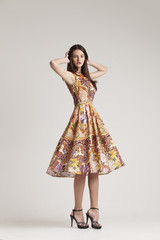 Naklejka premium Girl in fashion dress. Spring collection 