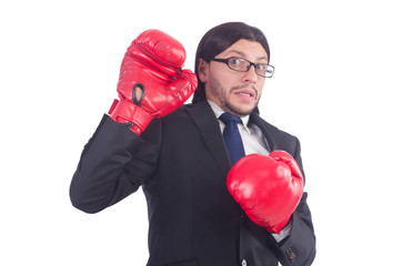 Businessman with boxing gloves on white