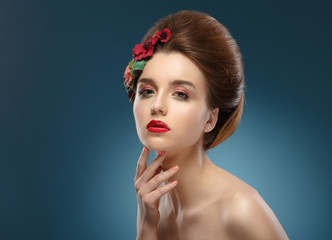 Naklejka premium Beauty Portrait. Woman Touching her Face. Beautiful girl with co