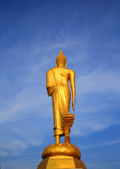 Behind of Buddha image on blue sky