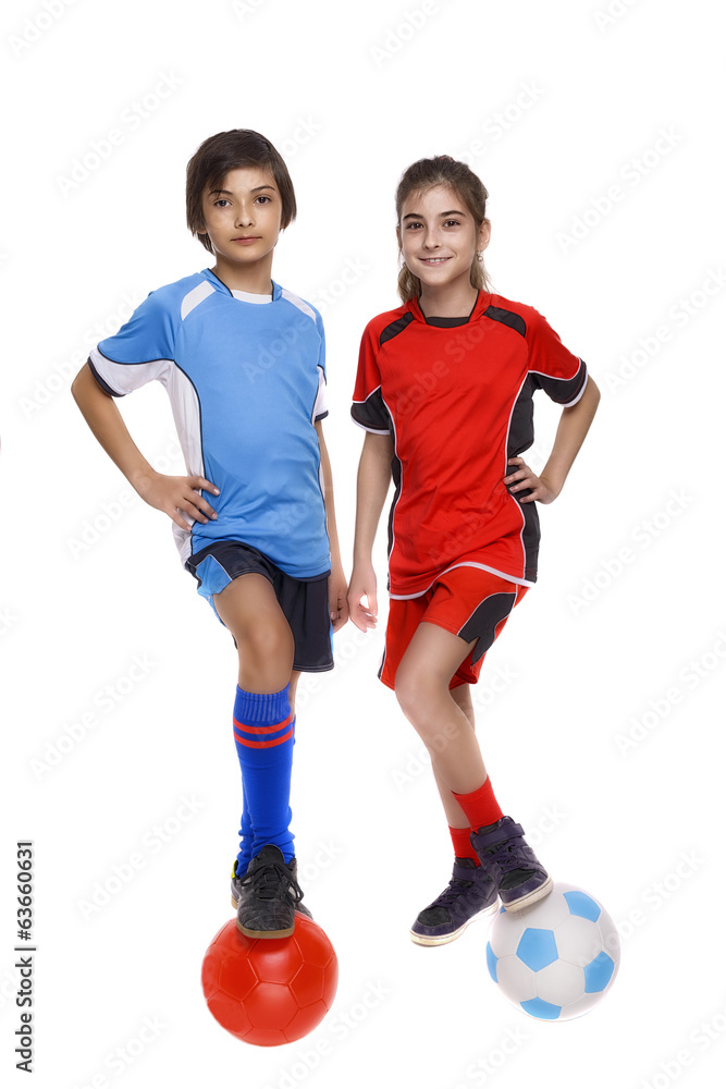 Wall mural couple of girl and boy dressed in soccer equipment