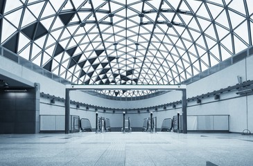 Moving escalator in the business center