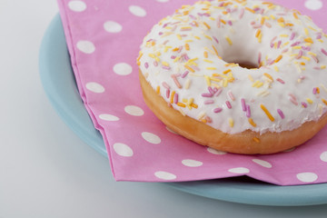 Donut with icing and sprinkles