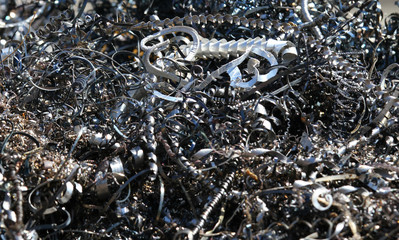 chips and curls of ferrous metal into landfill for recycling 3