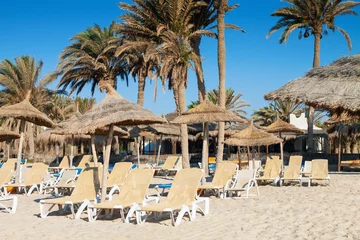 Gordijnen Sandy beach with deckchairs and parasols © Rostislav Sedlacek