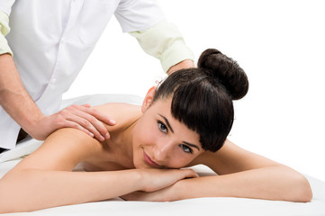 Obraz na płótnie Canvas Brunette female getting a massage.