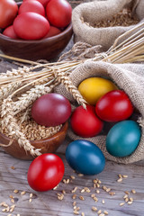 Painted eggs in a linen sack for the celebration of Easter