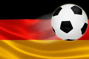 Naklejka premium Soccer Ball Leaps Out of Germany's Flag