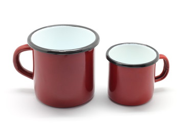 Enamel mugs isolated on white background