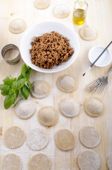 home made ravioli on wooden table