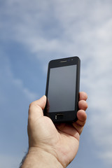 Mobile phone on the sky