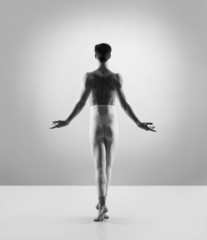 Sporty and athletic ballet dance. Black and white image.