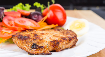 Grilled beef steak with salad