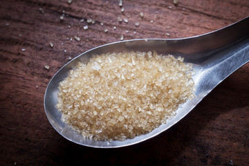 Sugar in spoon,food image.