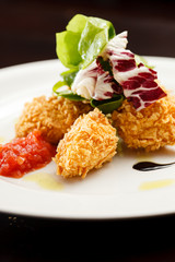 chicken nuggets with salad
