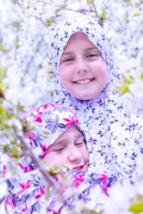 Two little muslim girls together