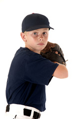 young baseball player ready to throw the ball
