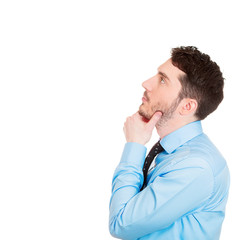 Daydreaming young businessman