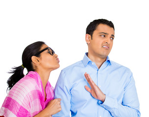 Nerd woman trying to kiss cocky guy isolated on white background