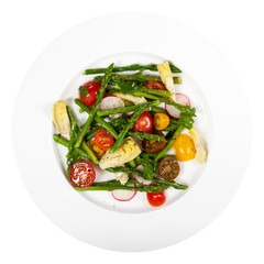 Delicious Fresh salad with asparagus, artichoke and tomatos