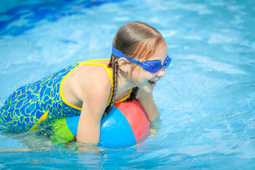 little girl in the swimming pool