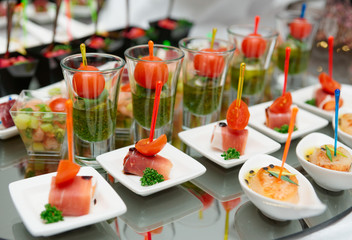 Various snacks in shot glasses