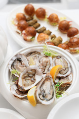 Fresh oysters and snacks