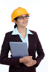Young Indian female engineer with tablet computer