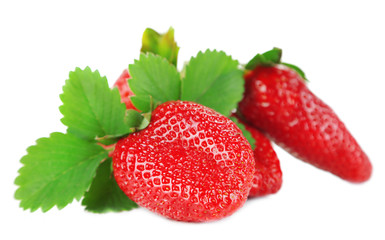 Strawberries with leaves isolated on white
