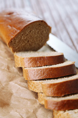 Bread  slices on wooden board, close-up