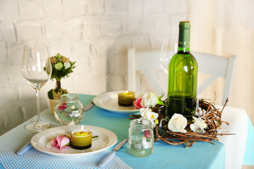Beautiful holiday Easter table setting in blue tones,