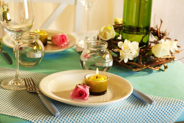 Beautiful holiday Easter table setting in blue tones,