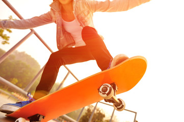 skateboarding woman legs