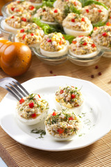 stuffed eggs with ham, red pepper and dill