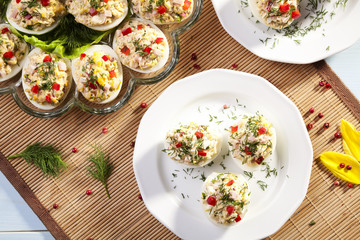 stuffed eggs with ham, red pepper and dill