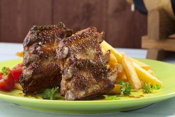 Grilled ribs on plate