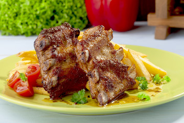 Grilled ribs on plate