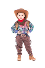 Little boy wearing cowboy suit