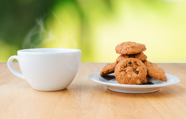 Coffee with cookies on the table
