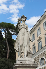 Obraz premium One of the four allegorical sculptures in Piazza del Popolo