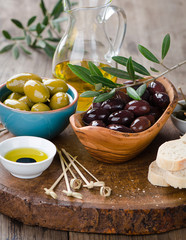 Fresh olives and olive oil