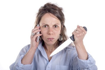 young woman with knife and phone