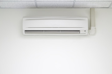 Air conditioner (AC) indoor unit or evaporator and wall mounted. That is part of mini split system or ductless system type. For removing heat and moisture from room. Including humidity control.
