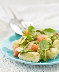 gnocchi with pesto sauce and smoked salmon