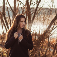 beautiful hipster girl in cold spring morning