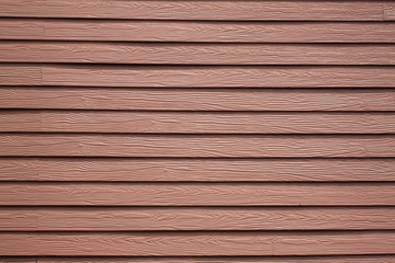 walls of the house are made of oak wood color.