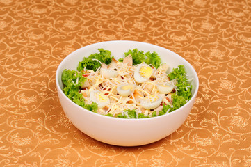 Fresh salad with chicken breast, cheese and eggs