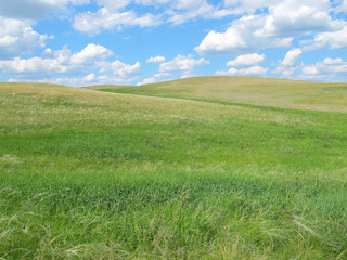 Obraz na płótnie Canvas Steppe hills against a blue sky