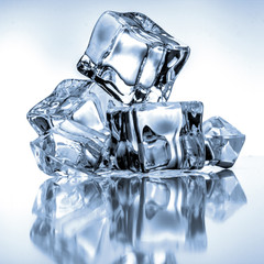 Ice cubes on blue background