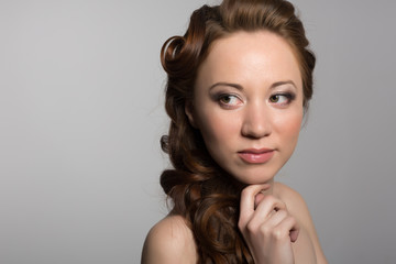 Naklejka premium Portrait of a girl wavy hair